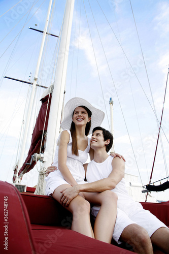 Couple sitting on yacht © ImageHit