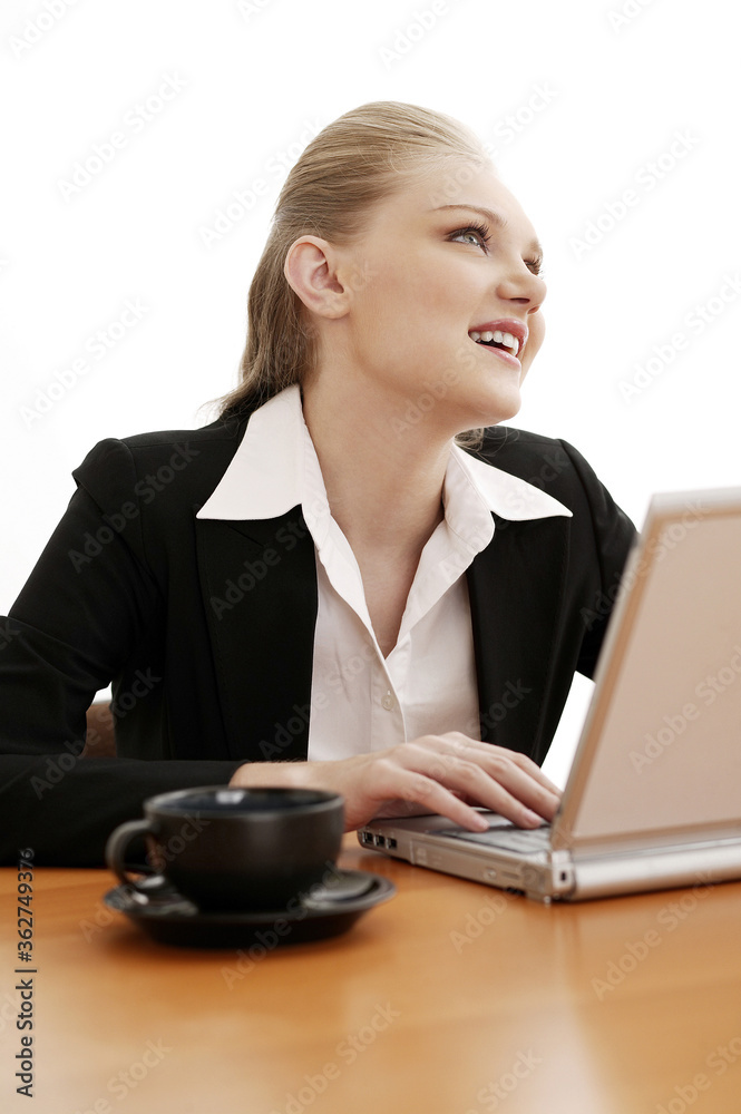 Businesswoman working on a laptop Businesswoman working on a laptop