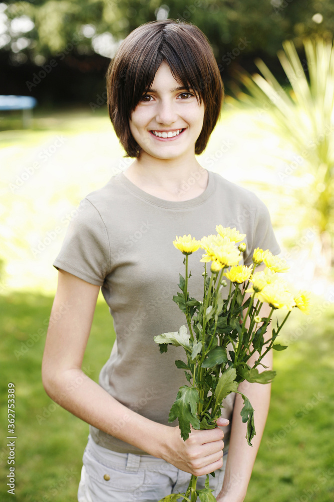Girl holding a bouquet of flowers
