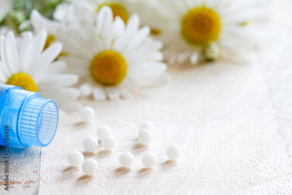 Homeopathic medication with chamomile flowers Homeopathic medication with chamomile flowers