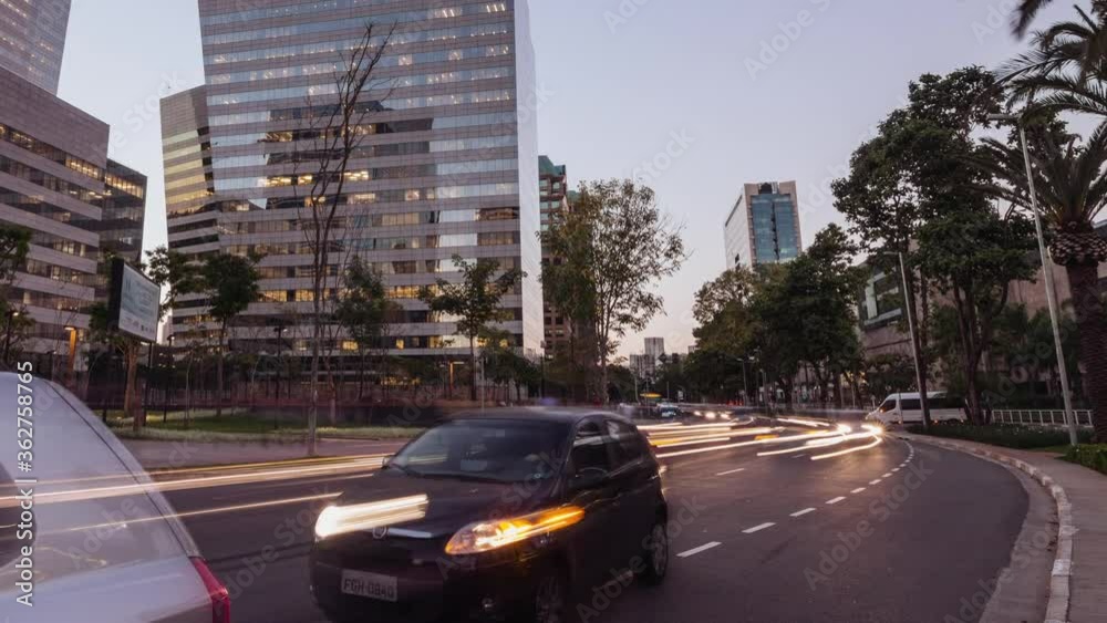 Timelapse of a big avenue with heavy traffic at sunset, Chucri Zaidan, Sao Paulo, Brazil Timelapse of a big avenue with heavy traffic at sunset, Chucri Zaidan, Sao Paulo, Brazil