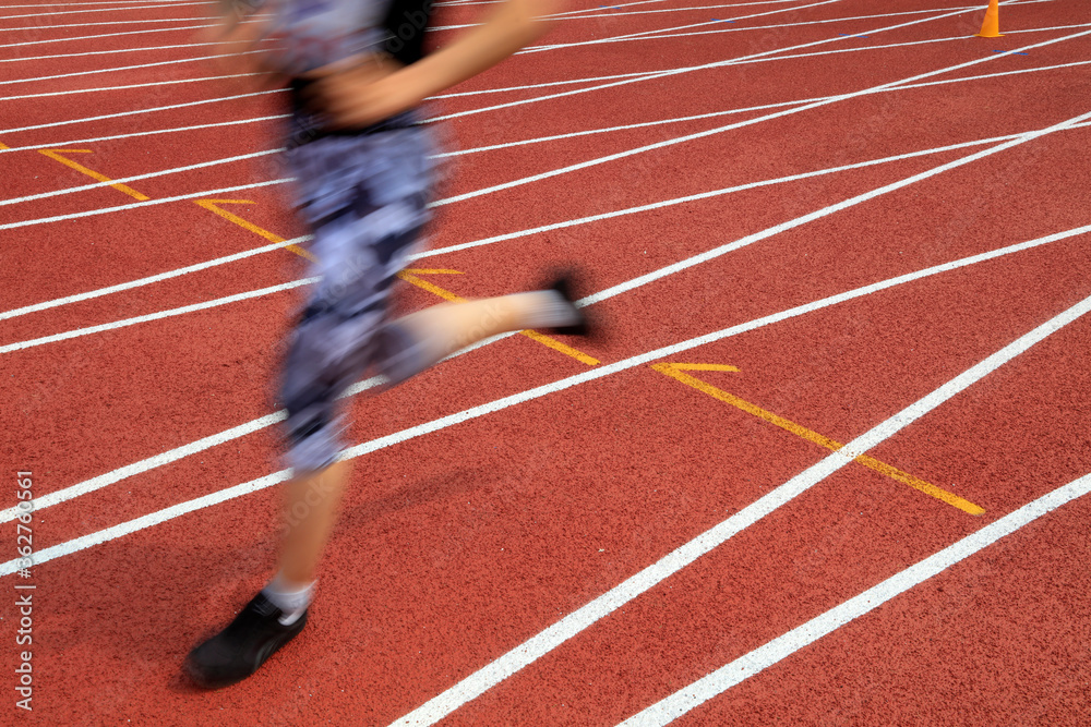 Fototapeta premium legs of a long distance runne