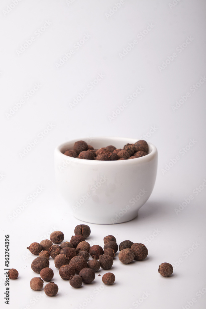 black pepper peas close up on a white background black pepper peas close up on a white background