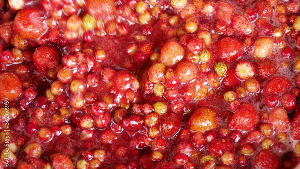 Cooking Strawberry Jam. Summer vitamins. Strawberries with sugar