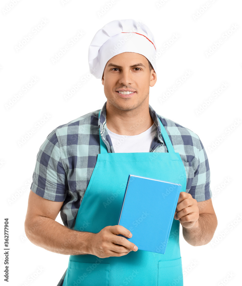 Young man with recipe book on white background Young man with recipe book on white background