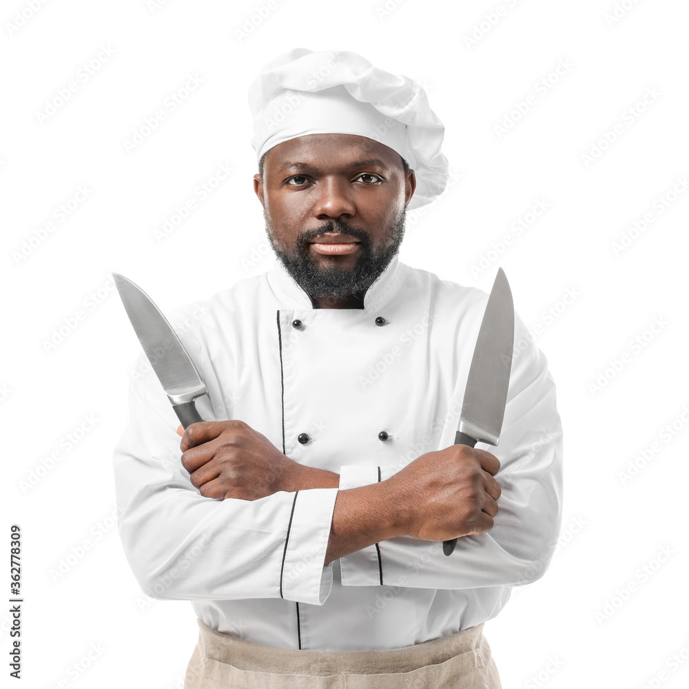 Male African-American chef with knives on white background Male African-American chef with knives on white background