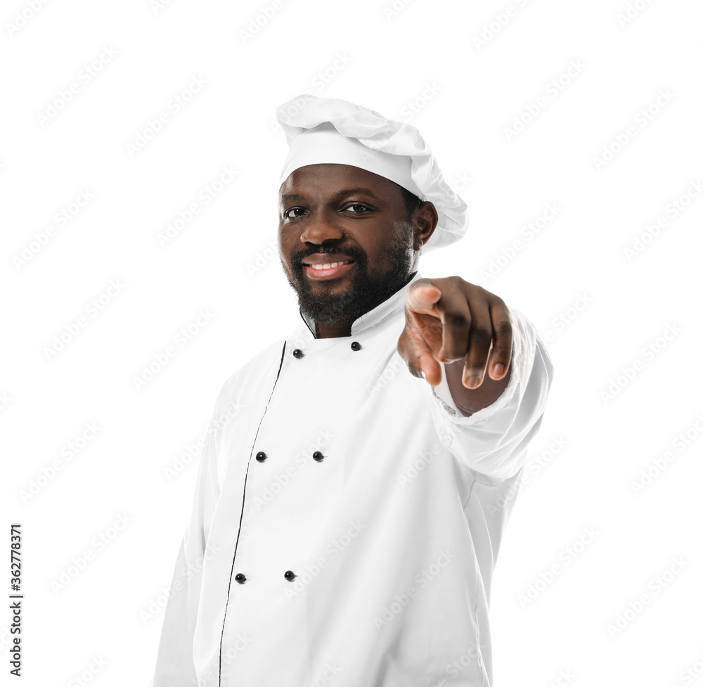 Male African-American chef pointing at viewer on white background