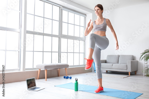 Sporty young woman training...