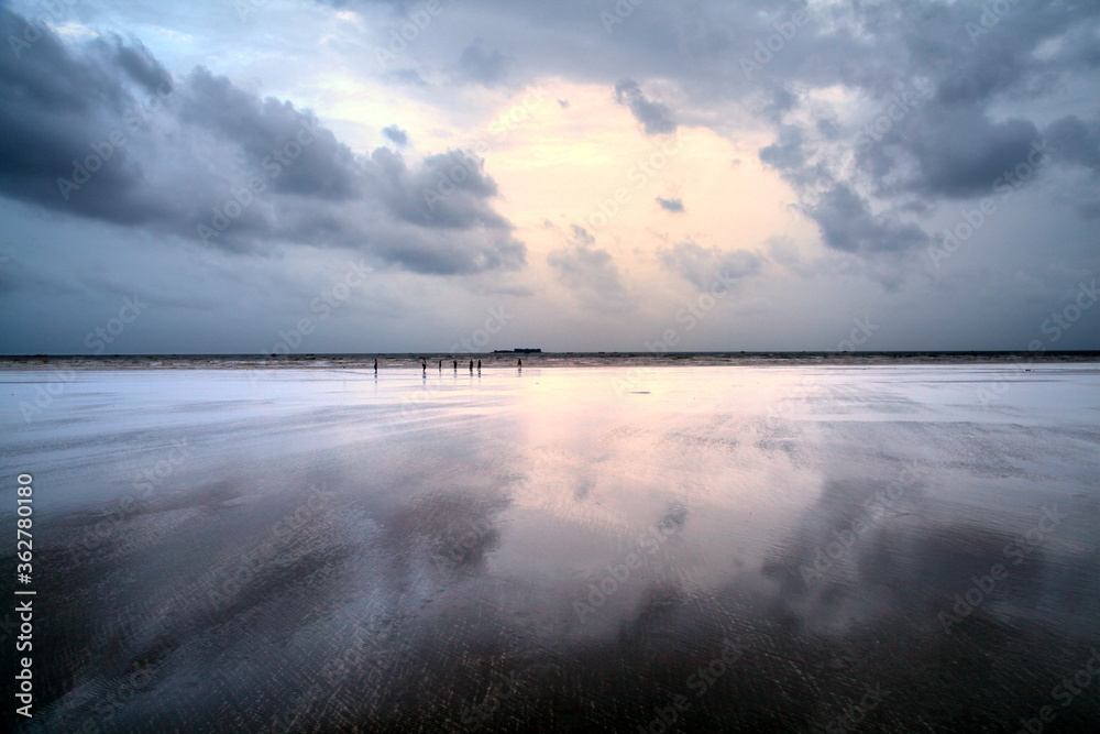Fototapeta premium Cloudy beach during rainy season at konkan, (Murud) Maharashtra, India