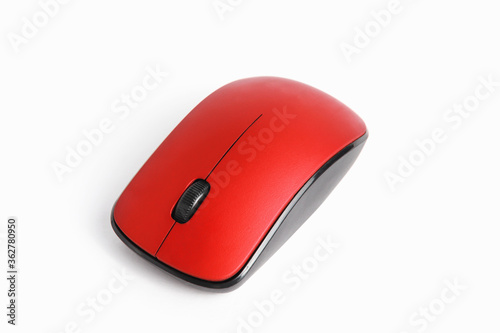 Red optical computer mouse. Wireless computer mouse isolated on white background, close-up