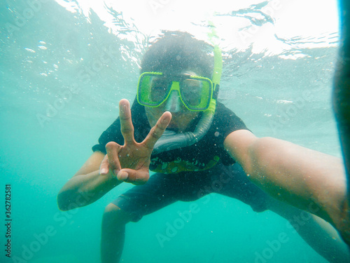 Snorkeling in the middle of the high seas while on vacation