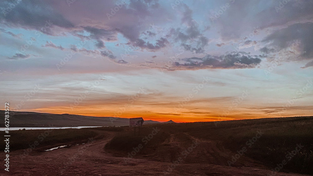 Fototapeta premium sunset on the road