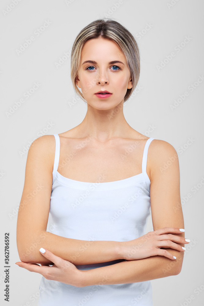Portrait of cute girl with arms folded on the stomach Portrait of cute girl with arms folded on the stomach