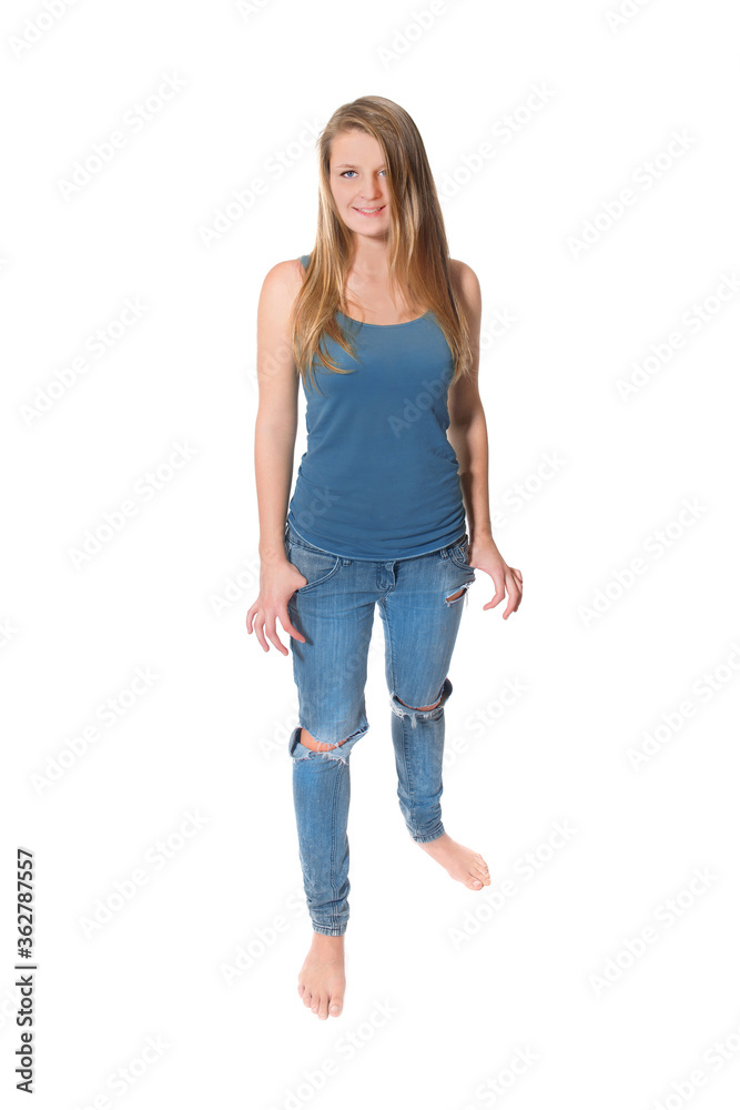 Full length portrait of a beautiful young woman wearing blue jeans and top, isolated on white studio background Full length portrait of a beautiful young woman wearing blue jeans and top, isolated on white studio background