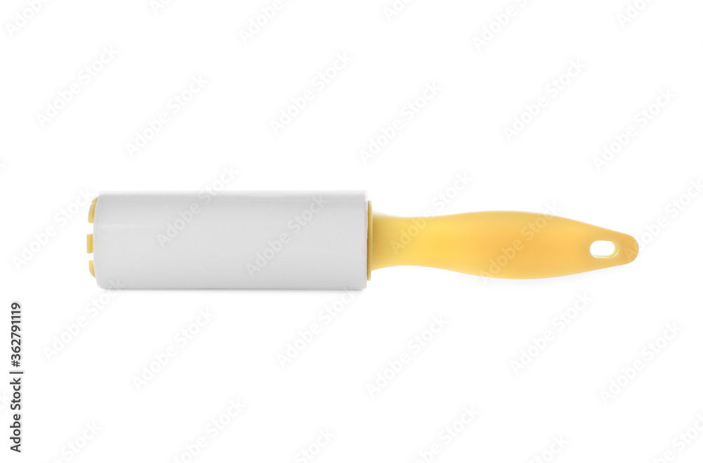 New lint roller with yellow handle isolated on white