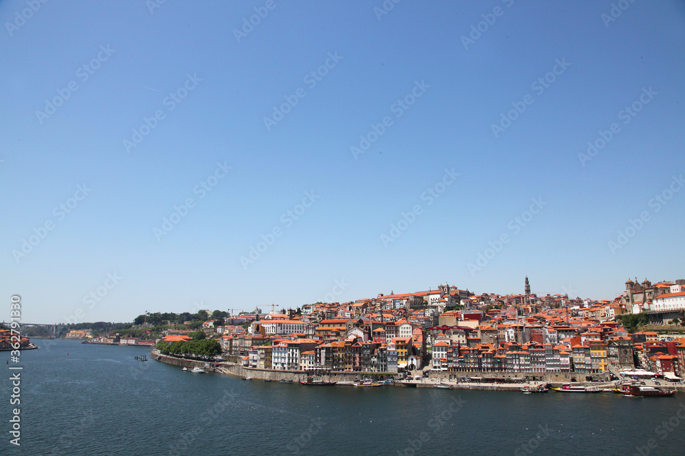 Sights and scenes of Porto in Portugal, featuring buildings, river and roads