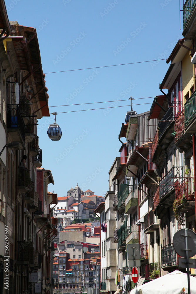 Obraz premium Sights and scenes of Porto in Portugal, featuring buildings, river and roads