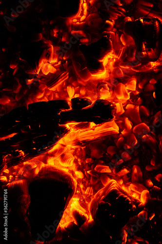 Hellfire and embers on a black background