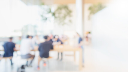 Abstract blurred interior modern office space with business people working banner background with copy space.