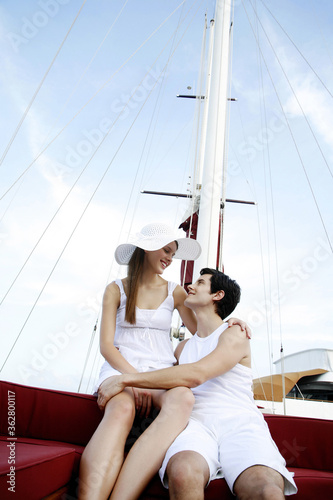 Couple cruising on a yacht © ImageHit