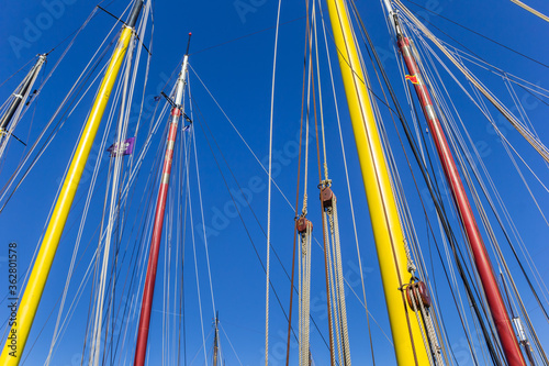 Masts, ropes and pulleys on sailing ships photo