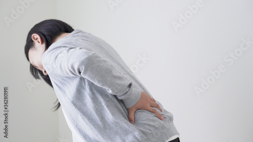 Cuadro en lienzo 腰痛の女性
