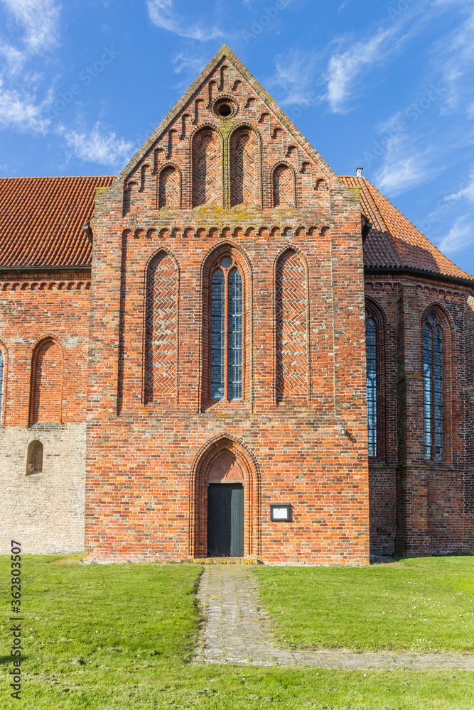 Door and facade of the historic Stefanus church in Holwierde, Netherlands Door and facade of the historic Stefanus church in Holwierde, Netherlands