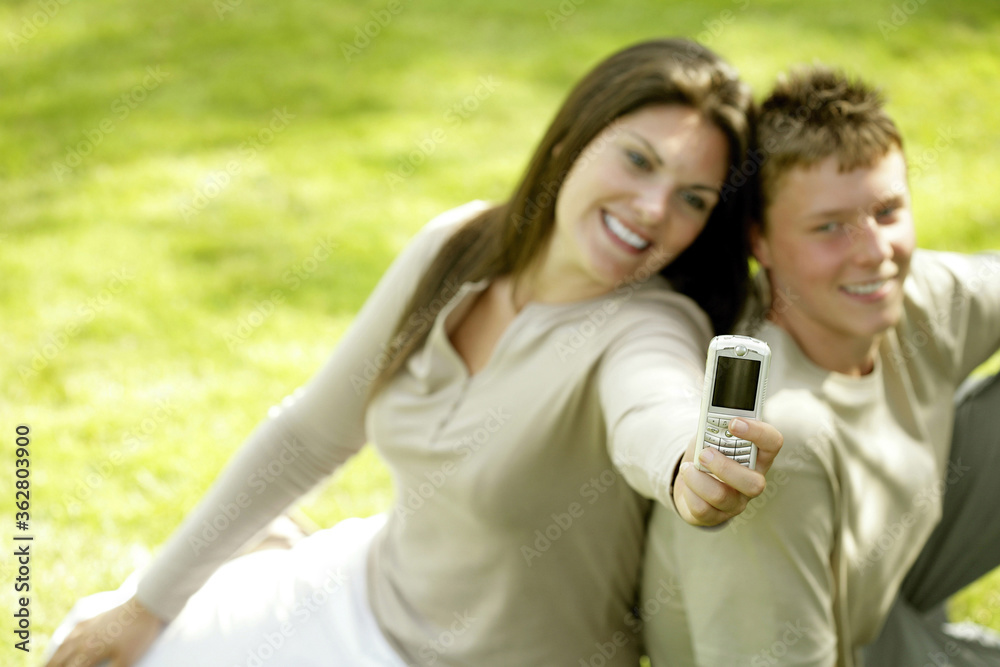 Mother and son taking picture with camera phone Mother and son taking picture with camera phone