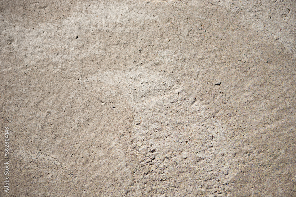 Space for text. Concrete light brown background. Abstract urban texture.