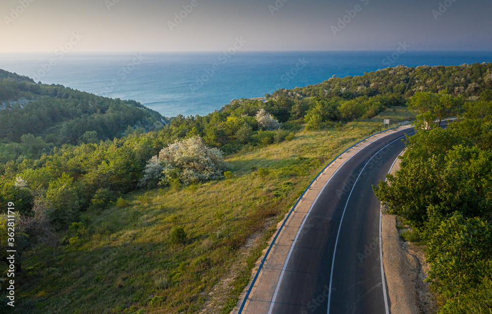 Aerial view over the coast road way from Balchik Bulgaria at the shore of Black Sea during an amazing summer morning
