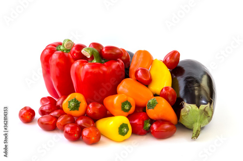 Healthy food, vegetable, paprika, eggplant and tomatos on a white background