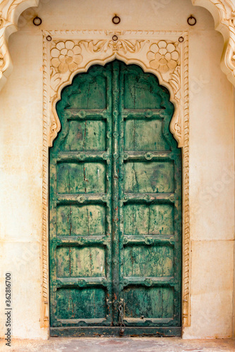 Jodhpur, Rajasthan, India – December 27, 2014 : Details of an old style well decorated door in the Mehrangarh Fort - Jodhpur