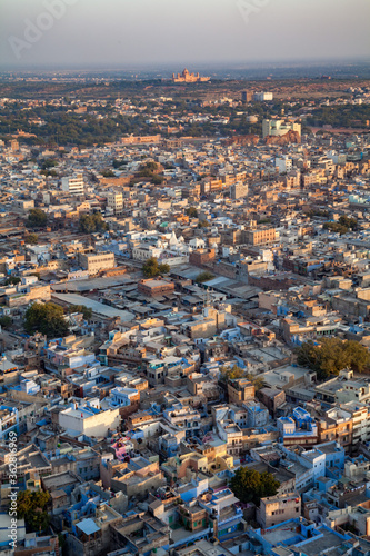 A beautiful view of Blue City - Jodhpur and Umaid Bhavan Palace seen from Mehrangarh Fort on a sun soaked day at Jodhpur,