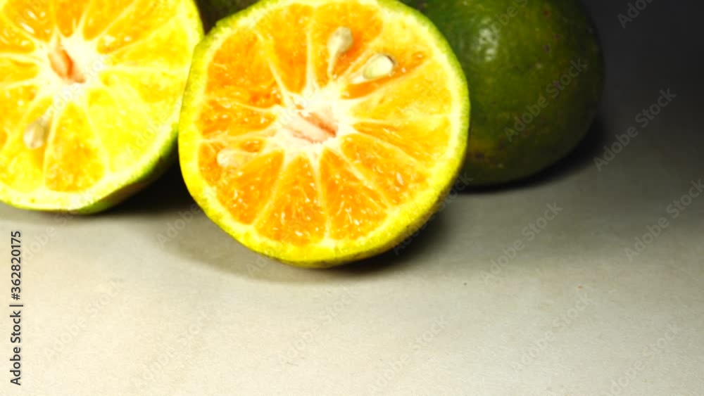 4K Marco shot of orange fruit and slide.Close up flesh citrus orange 4K Marco shot of orange fruit and slide.Close up flesh citrus orange