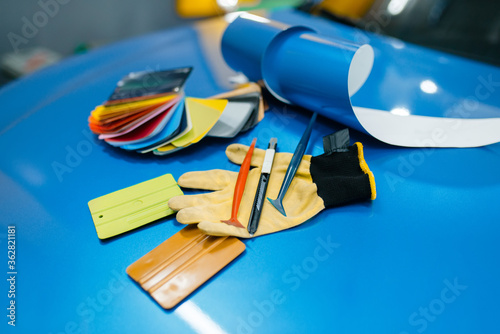 Car wrapping, color palette and installation tools photo
