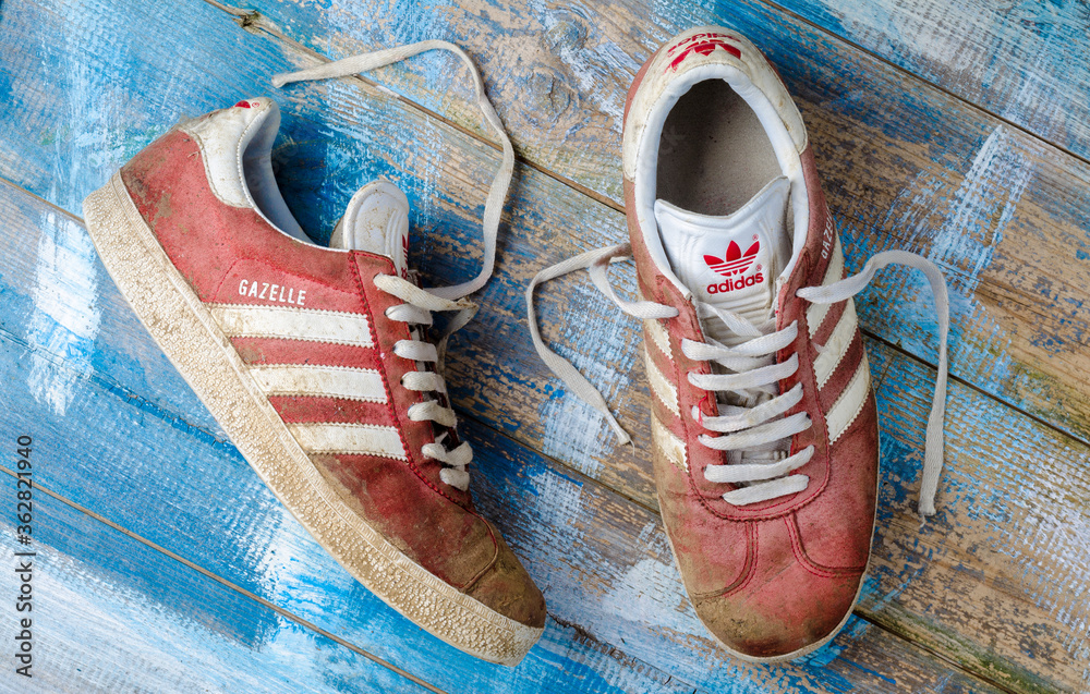 London, England - May 08, 2015: Pair of Adidas Gazelle Tennis Trainers,  Adidas are a German Sports manufacturer founded in 1924 Stock-Foto | Adobe  Stock