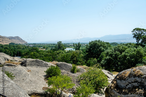 Panoramic top view of a mountain valley. River on a sunny day. Nature landscape. Georgia