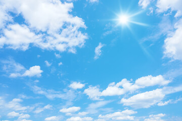 blue sky with sun and clouds background