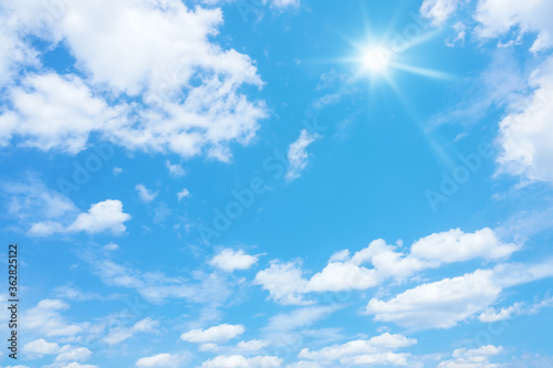 Fototapeta Naklejka Na Ścianę i Meble -  blue sky with sun and clouds background