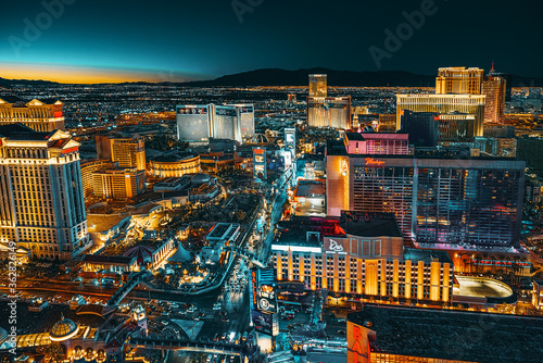 Canvas Print Main street of Las Vegas-is the Strip in evening time.