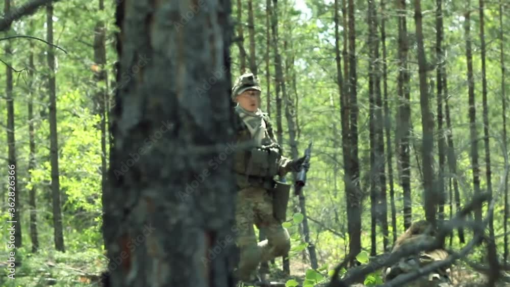 Killed player with red flag goes to recovery camp, armed US soldier on range in active military game airsoft Killed player with red flag goes to recovery camp, armed US soldier on range in active military game airsoft