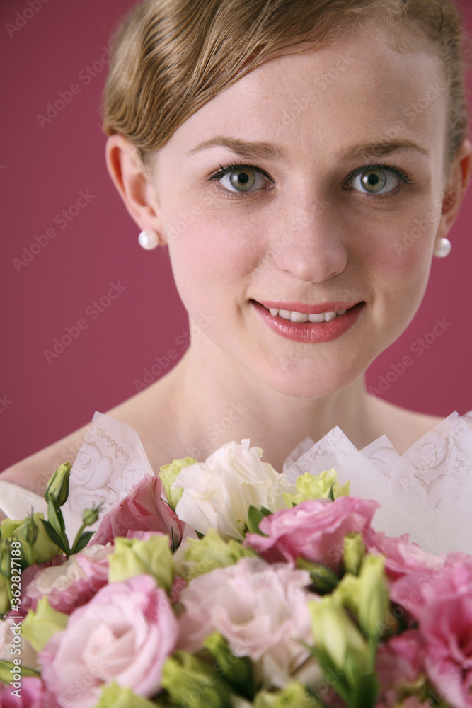 Woman with a bouquet of flowers Woman with a bouquet of flowers
