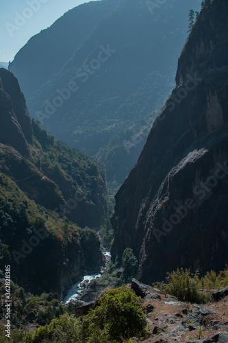 Marshyangdi river flowing underneath the surounding mountains, Annapurna circuit, Nepal photo