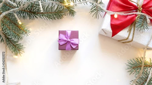 Wallpaper Mural Hands put a New Years violet gift box. Torontodigital.ca