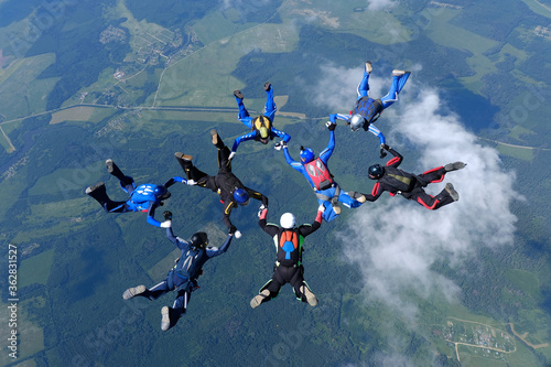Фотография Skydiving. Formations. A group of skydivers is in the sky.