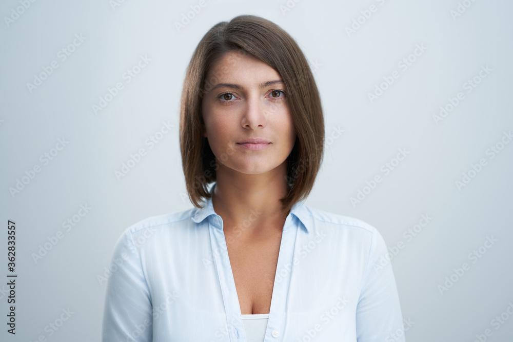 Face portrait of attractive woman over white background
