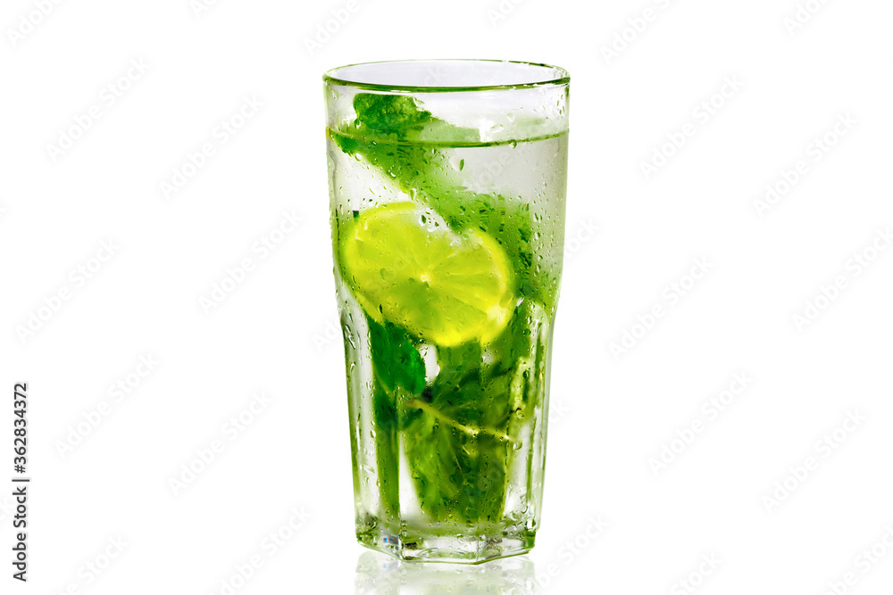 The mojito cocktail is isolated on a white background. Refreshing drink. The mojito cocktail is isolated on a white background. Refreshing drink.