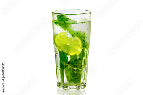 The mojito cocktail is isolated on a white background. Refreshing drink.