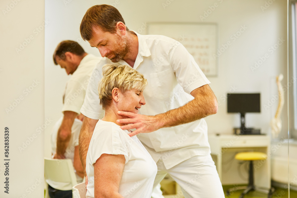 Fototapeta premium Competent chiropractor treats back pain