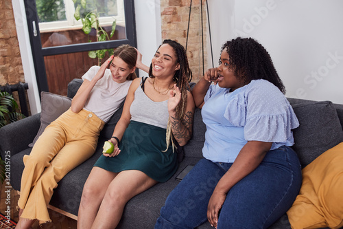 Vászonkép Charming women spending leisure time at home